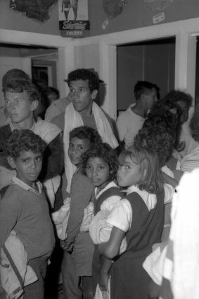 Charles Perkins with aboriginal school children at Kempsey pool.