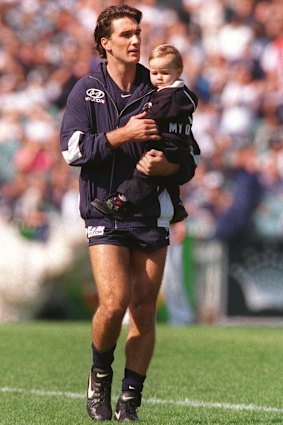 Stephen Silvagni with a baby Jack on the day of Stephen’s 250th game.