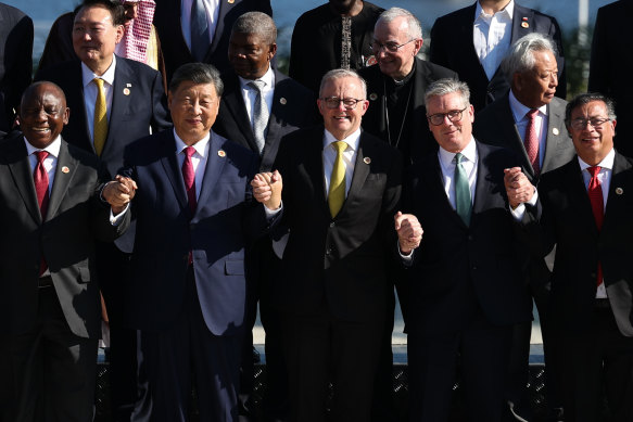 Chinese President Xi Jinping, Australian Prime Minister Anthony Albanese and British Prime Minister Keir Starmer in the group photo of G20 leaders.