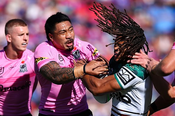 Knights winger Dom Young braces for contact on Sunday.