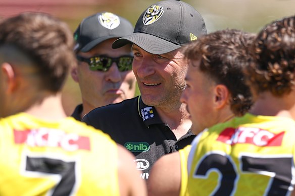 Adem Yze addressing the Richmond players during the match simulation against Essendon.