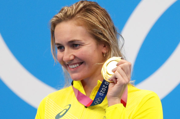 Ariarne Titmus displays her hard-won 400m freestyle Olympic gold medal.