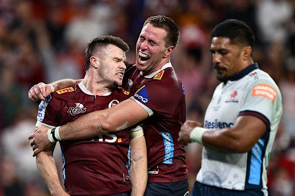Isaac Henry celebrates after scoring a try against the Waratahs. The Reds know success on the field is the most important thing.