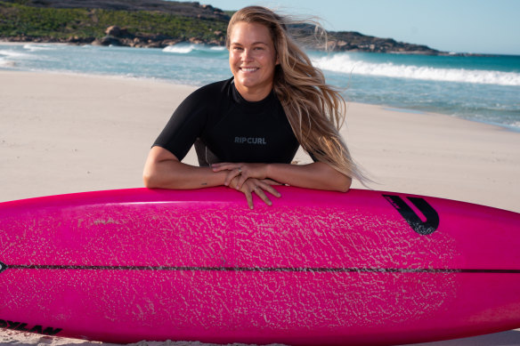 Felicity Palmateer and her favourite, hot-pink big wave gun.