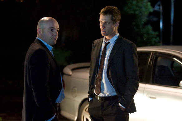 Scott McGregor (right) plays a police officer in 'Neighbours'.