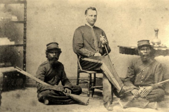 The author’s great-great grandfather Reginald Uhr (centre), Queensland Native Police officer and “a professional killer of Aborigines”, with troopers, circa 1868.