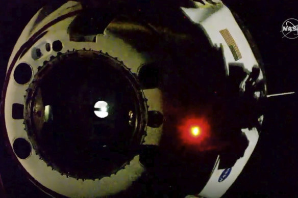 In this image from video made available by NASA, the SpaceX Crew Dragon capsule separates from the International Space Station.