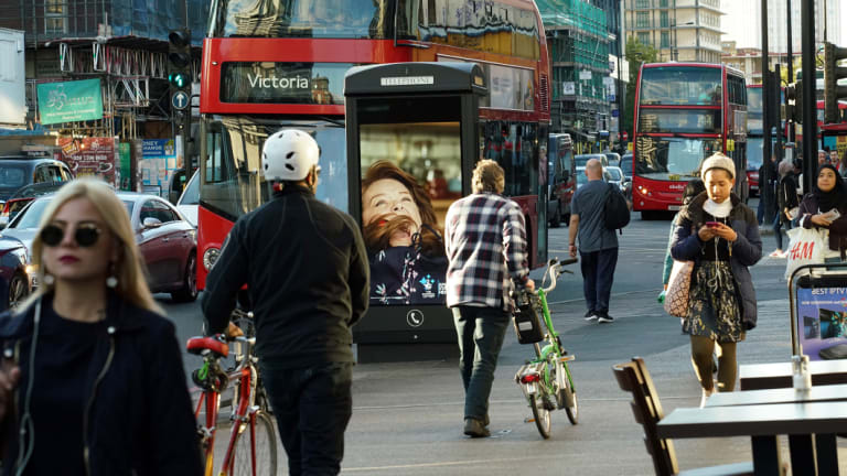 London is being flooded with new phone boxes. Critics say they are basically glorified billboards, but planning laws treat them as an essential utility.