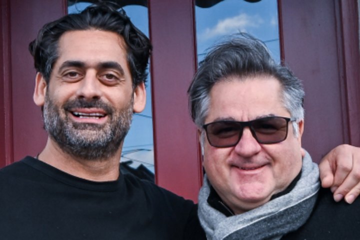 Jon Adgemis (left) of Public Hospitality Group with Guy Grossi outside the rebooted Clifton Hotel at Kew Junction.