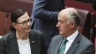 Liberal Senators Concetta Fierravanti-Wells and Eric Abetz in the Senate the morning after she criticised Prime Minister Scott Morrison.