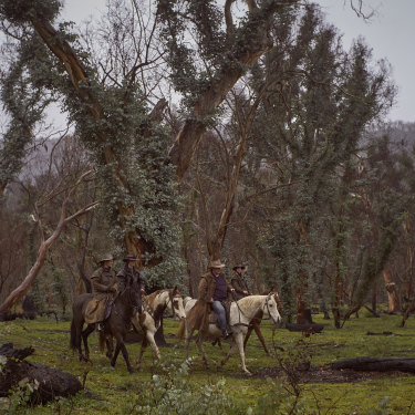The Maguire family emerge out of the regrowth at the back of the property in the Bogong High Plains. 