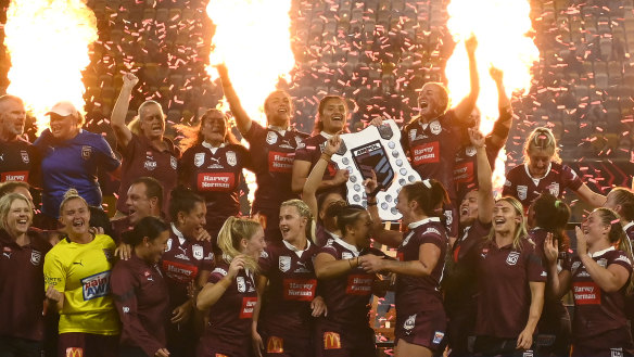 Queensland’s players celebrate after clinching the two-game Origin series in 2023.