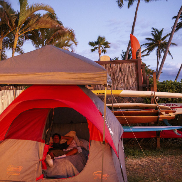 Frank Puglisi in a tent while camping in Paul Romero’s backyard in Kihei, Hawaii. Puglisi lost his boat, which he lived aboard, in Lahaina to the wildfire.