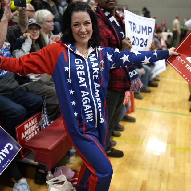 A supporter waits for Trump to arrive at a rally in Iowa last week.