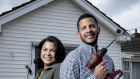 Serial renovators Sharon and Chris Reay at their newly purchased home. They say they were able to buy their home from cutting costs via renovations. 
