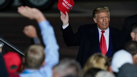 US President Donald Trump at a campaign rally in Mosinee, Wisconsin. Hackers stole $US2.3 million from the state Republican Party's account that was being used to help re-elect him. 