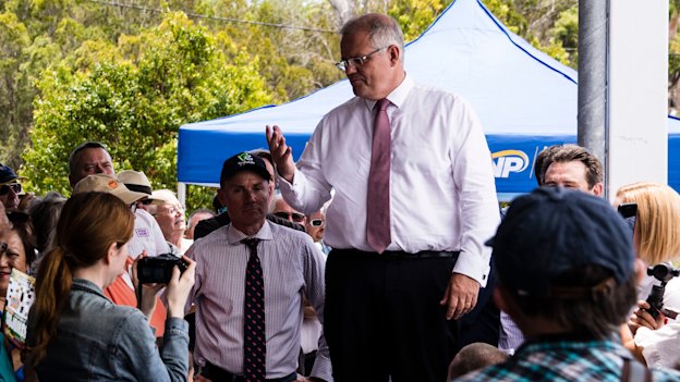 Scott Morrison speaks to voters during a week-long sweep of marginal seats in Brisbane. 