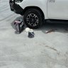 Man run over by ute on Brisbane worksite may lose leg