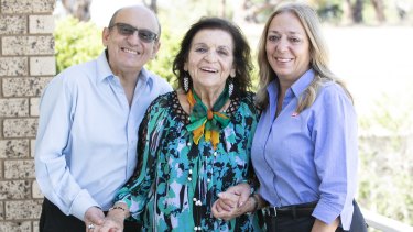 Family matriarch Alice Xyrakis (centre) with son Manuel and daughter Irene.
