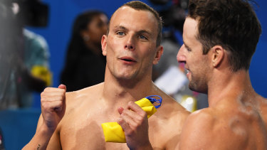 Kyle Chalmers (left) and James Magnussen after the relay win.