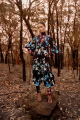 A model poses for a new KITX campaign in burnt-out bushland at Orangeville, south-west of Sydney.