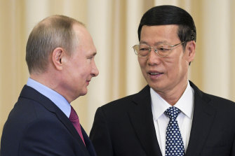 Chinese Vice-Premier Zhang Gaoli, right, is welcomed by Russian President Vladimir Putin in 2017.