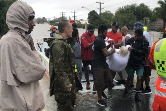 The Fijians helped bring extra manpower to the flood rescues.