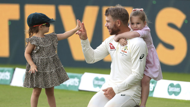 David Warner takes time out with his daughters after Australia's triumph at Edgbaston.