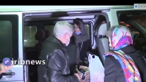Australian academic Kylie Moore-Gilbert, centre, inside the van, is seen in Tehran, Iran before being released. 