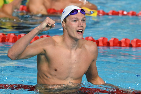 Scotsman Duncan Scott celebrates after winning the men's 100m freestyle on Sunday night.