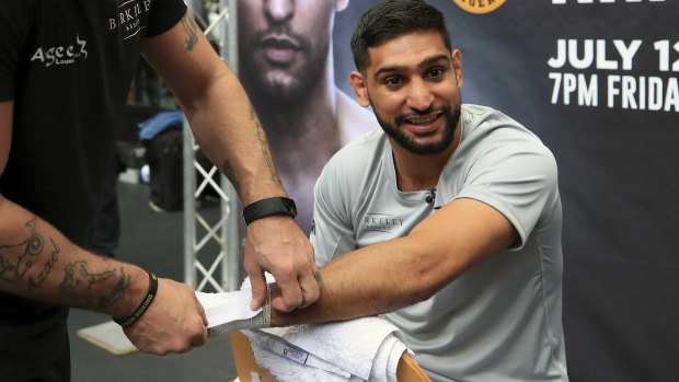 Britain's Amir Khan claimed on Tuesday that a deal to fight Filipino legend Manny Pacquiao had been signed.