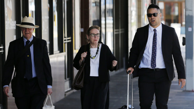 Jarryd Hayne with his lawyer and barrister outside court.