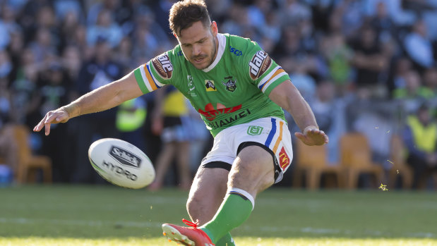 Aidan Sezer slots the winning field goal for Canberra against Cronulla on Sunday, one of three he kicked in the match.