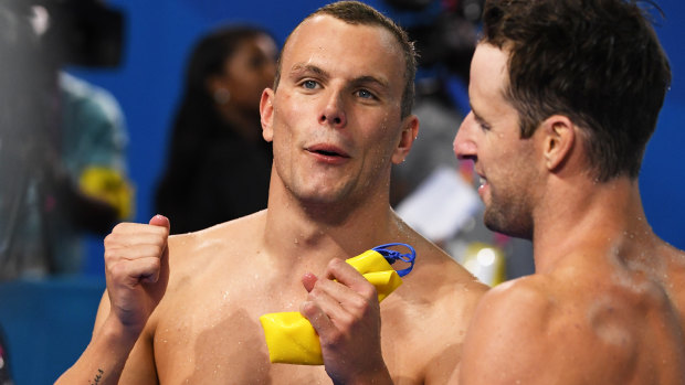 Kyle Chalmers (left) and James Magnussen after the relay win.