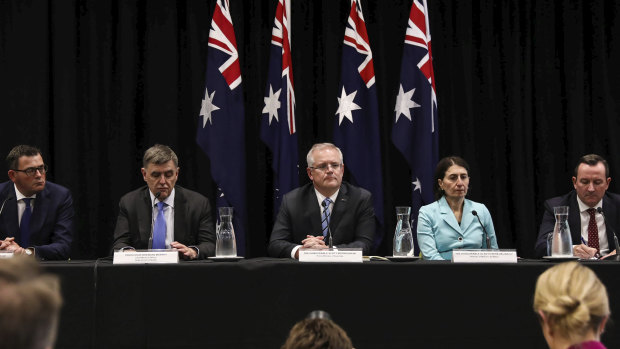 Victorian Premier Daniel Andrews, Chief Medical Officer Brendan Murphy, Prime Minister Scott Morrison, NSW Premier Gladys Berejiklian and WA Premier Mark Mcgowan speak to the media on Friday.