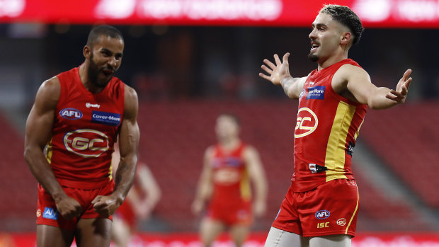 Bound for glory: Gold Coast's Izak Rankine on debut against Melbourne.