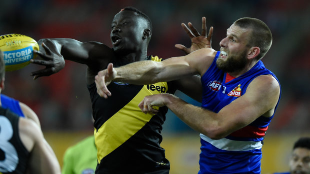 Out-gunned: Tiger Mabior Chol clears ahead of Bulldog Jackson Trengove.