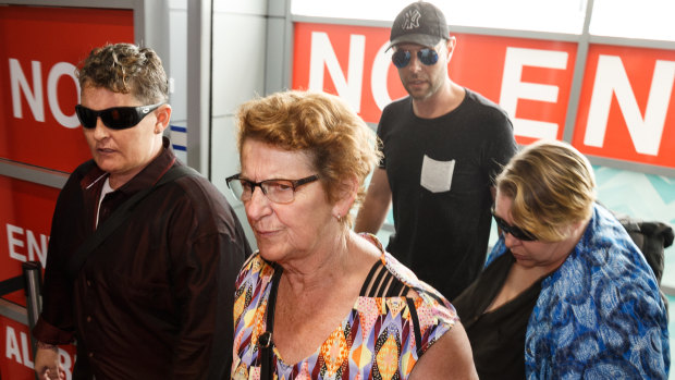 Bali Nine drug smuggler Renae Lawrence arrives at Newcastle Airport with her mother Beverley Waterman and other family members on Thursday.