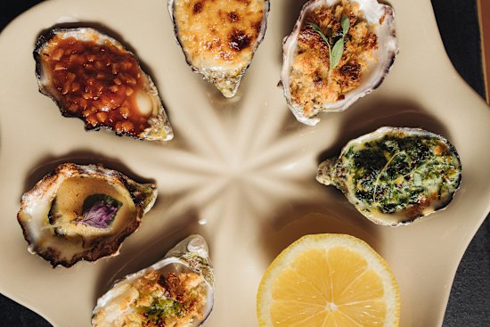 Hot oysters are available in kilpatrick, mornay, baked miso, rockefeller, garlic butter crumb.