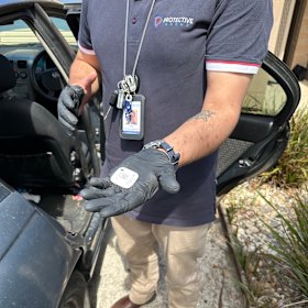 Joel Svensson recovering a Bluetooth tracker from a DV victim’s car.