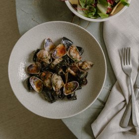 Squid ink calamarata, pippis and jamon XO.