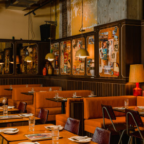 The bright orange dining room.