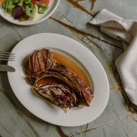 Agrodolce pork chop with charred radicchio.