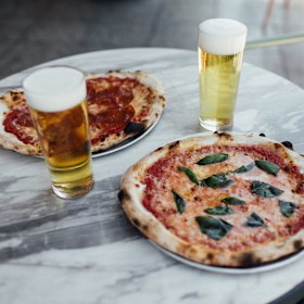 Pizza and beer at Johnny’s Green Room.