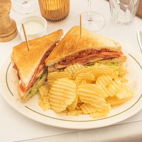 The club sandwich with crisps.