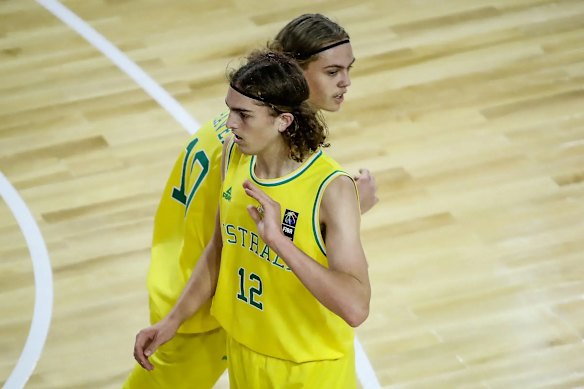 Best mates and former Australian basketball teammates Luke Jackson (No.12) and Luke Travers.