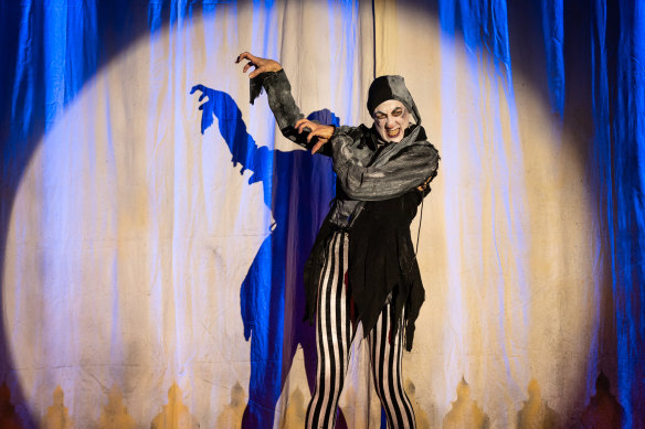 Jennifer Vuletic’s jester serves as the audience’s antagonist and guide.