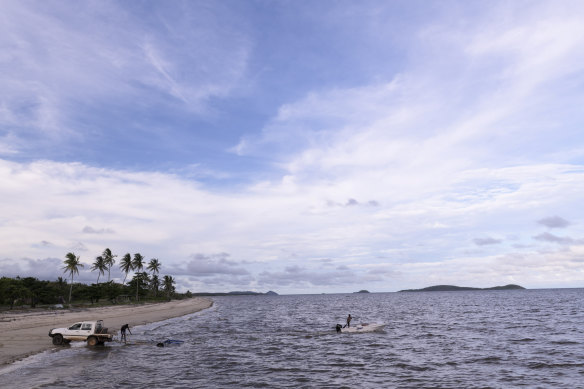 Residents fishing at Quintell Beach, Lockhart River.