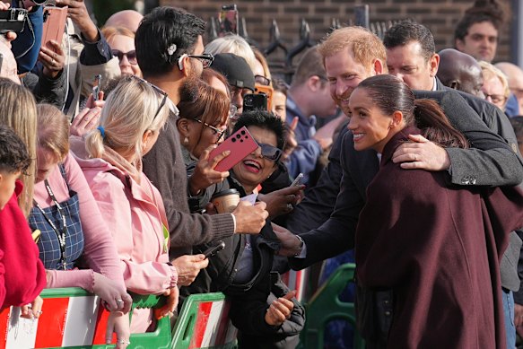The Duke and Duchess of Sussex meet members of the public as they arrive at the Community Recording Studio in Nottingham.