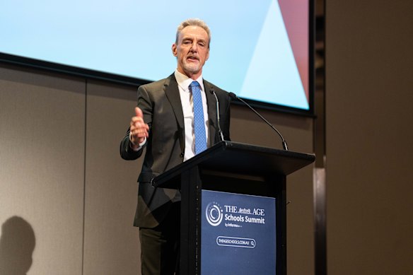 David Howes from the Department of Education on stage at the summit.